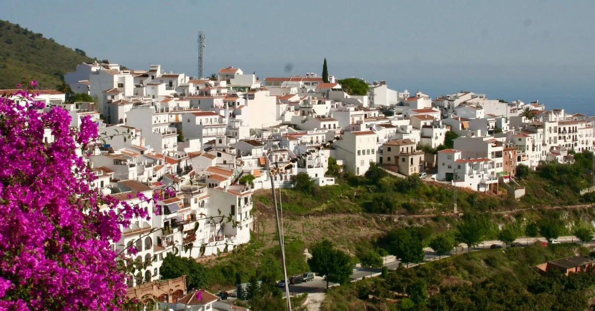 Andalucia village scene of white washed houses overlooking the water